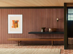 Hikari (光) — Light print by Angeline Harrington, shown in a room with a dark striped wall