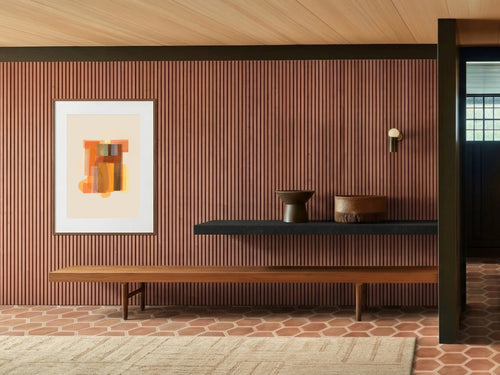 Hikari (光) — Light print by Angeline Harrington, shown in a room with a dark striped wall